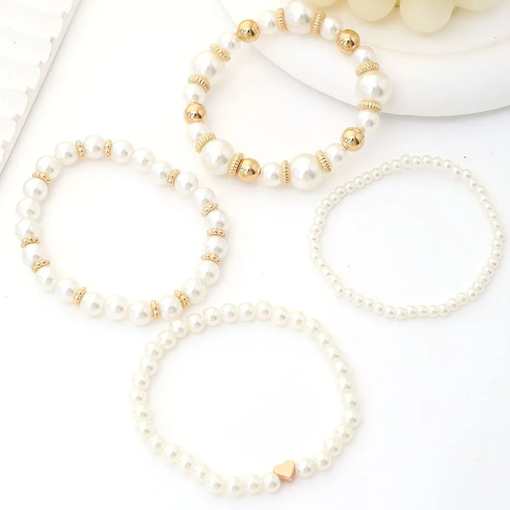 4-Piece Elegant White Faux Pearl & Heart Bracelet Set